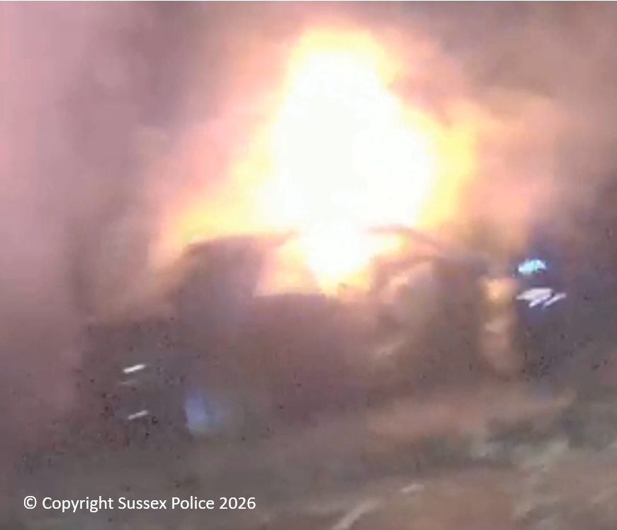 Officer and bystander bravery saves man from burning car
